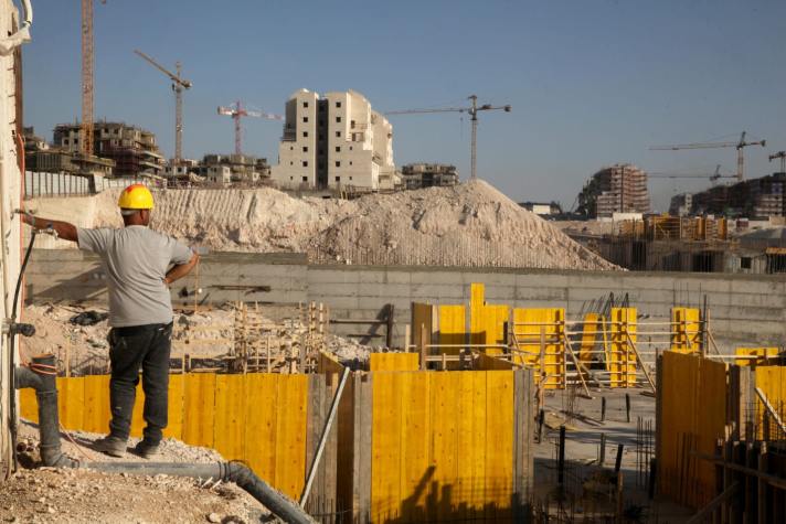 A Palestinian worker in in Beit Shemesh, November 2019. Credit: Gil Cohen Magen [Haaretz]