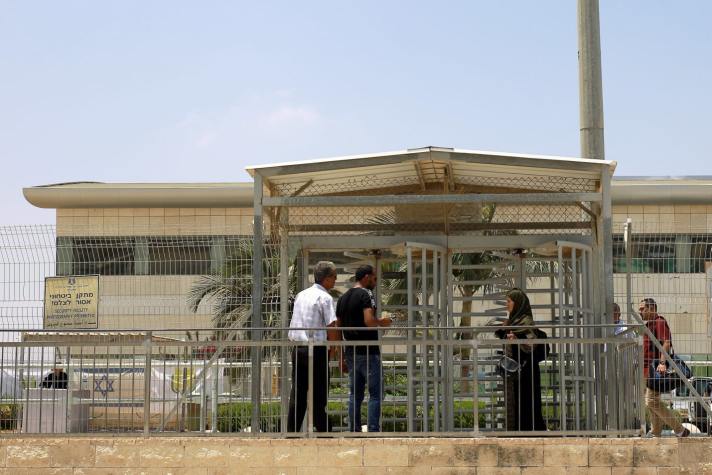 Palestinians outside the Erez Gaza crossing, June 23, 2019Credit: Ilan Assayag [Haaretz]