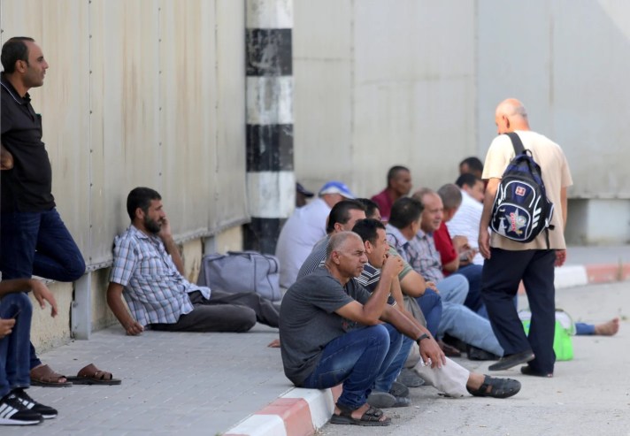 Palestinians waiting at Gaza's Erez crossing, July 9, 2019Credit: Ilan Assayag [Haaretz]